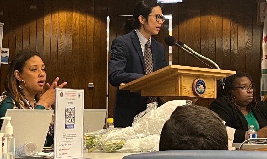 Person speaking at a podium.